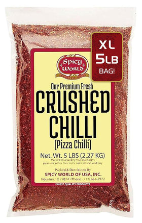 Spicy World crushed red pepper flakes in a 5 lb bulk pack for versatile cooking.