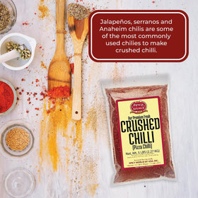 Spicy World crushed red pepper texture close-up ready to sprinkle on dishes.