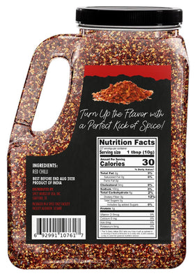 Closeup of Spicy World flakes showing vibrant color and natural heat for cooking.