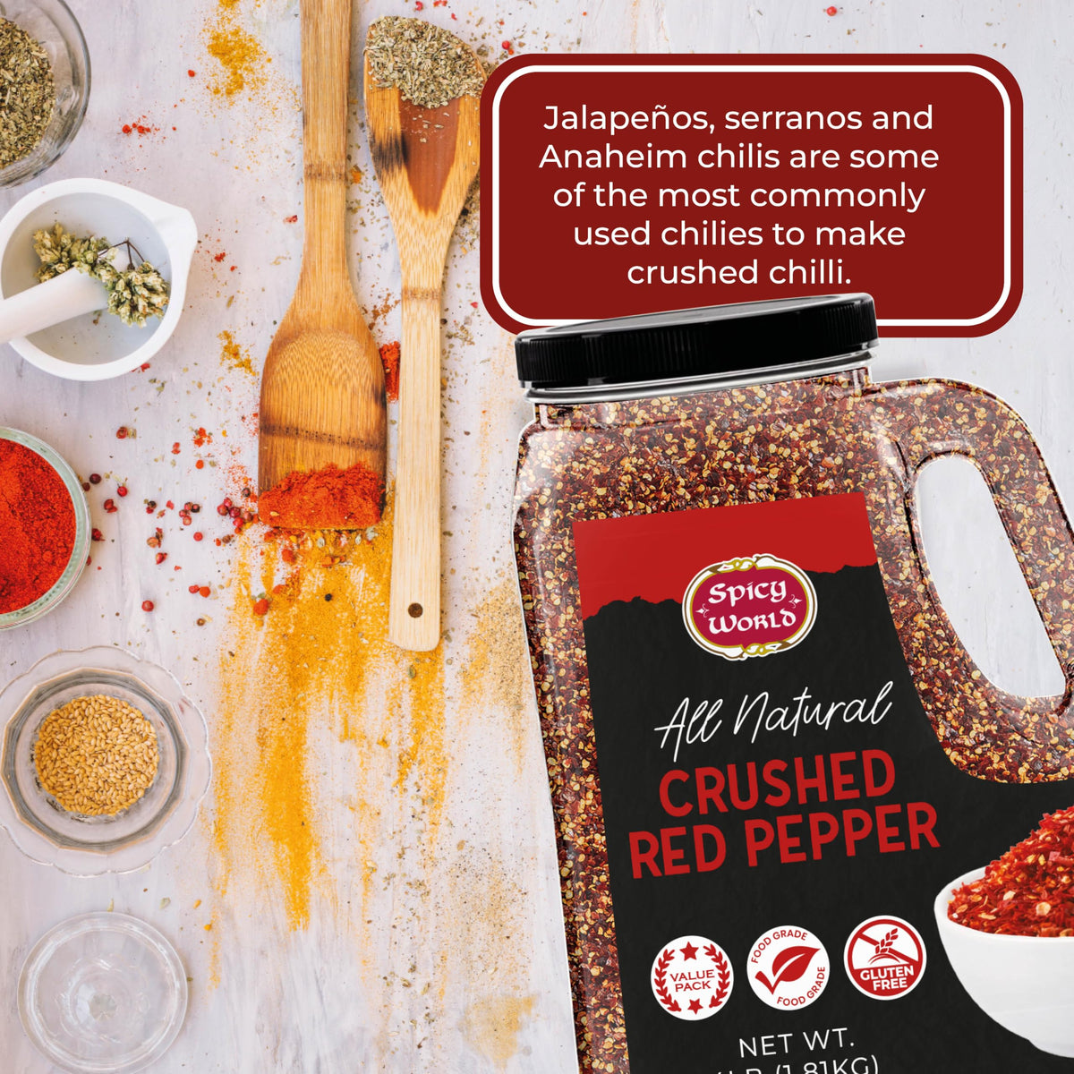 Spicy World kitchen setup with jar, spoon, and pepper flakes.