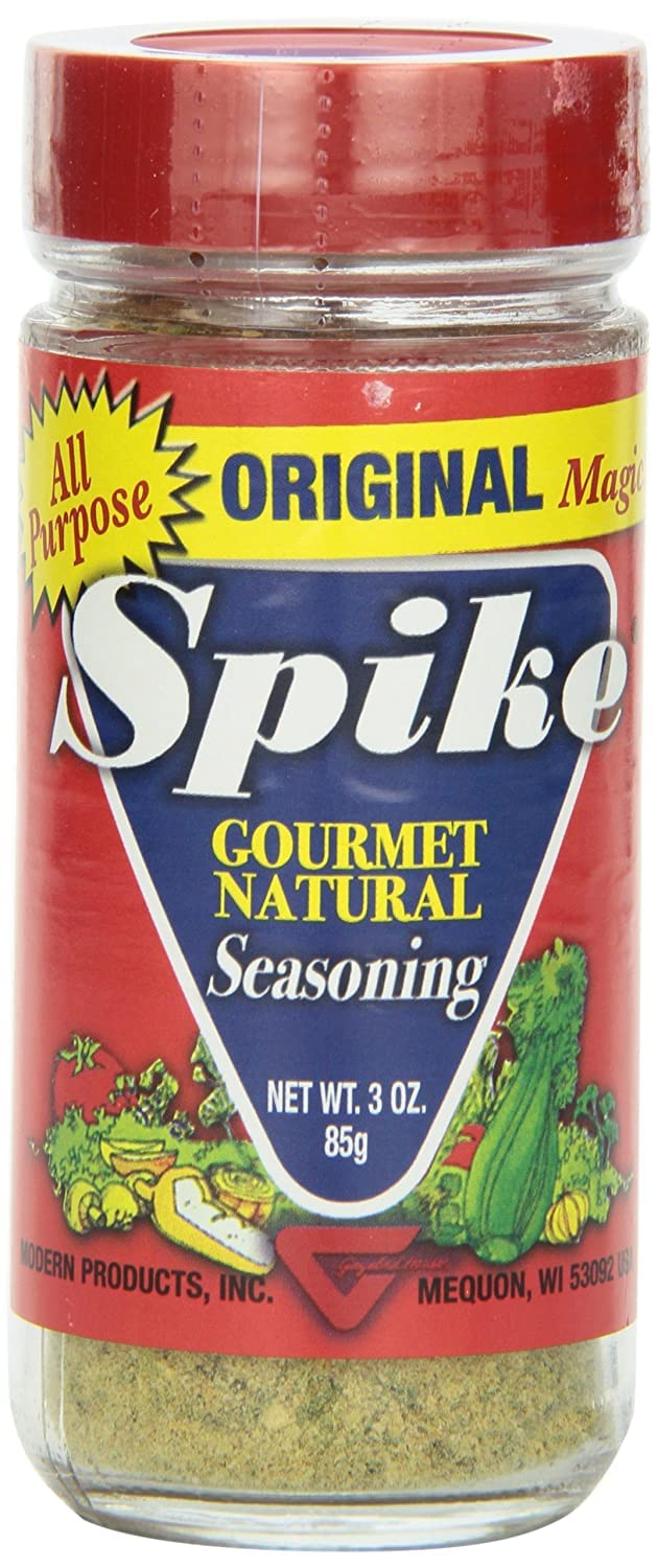 Close-up of Spike jar, showcasing low-sodium, no sugar, no MSG attributes.