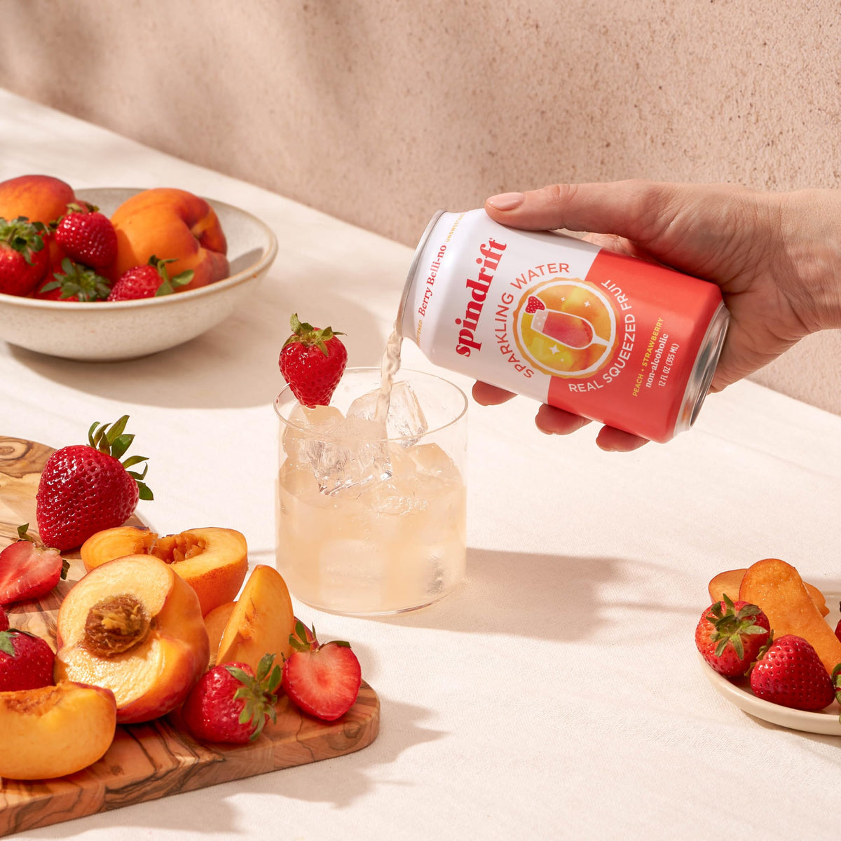 Spindrift Berry Belli-no bubbles in a glass for easy sipping.