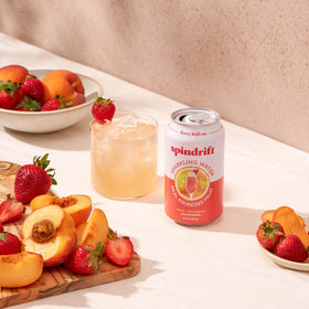 Spindrift Berry Belli-no cans chilling in the fridge for refreshment.