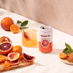 Spindrift Blood Orange Tangerine can-front view highlights 12 calories per can.