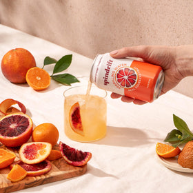 Spindrift Blood Orange Tangerine can with real fruit bits for authentic flavor.