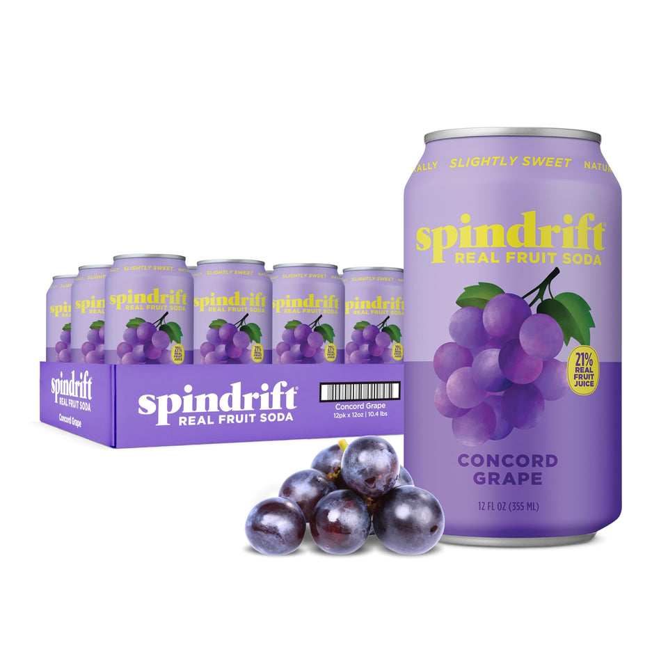 Spindrift Concord Freeze grape soda poured into a glass for real fruit flavor
