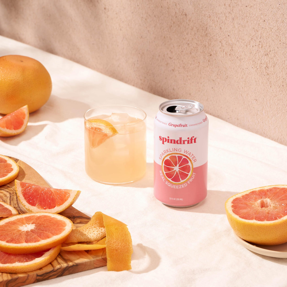 Glass of Spindrift Grapefruit over ice showcasing bright citrus aroma