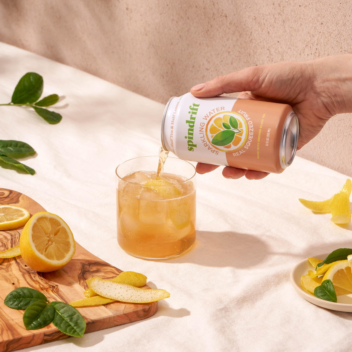 Spindrift Half Tea & Half Lemon label detail shows natural ingredients.