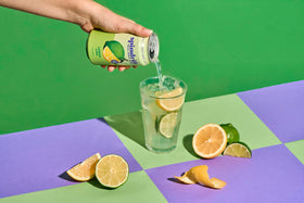 Spindrift Lemon Lime pack 12 cans shows convenient, non-ultra-processed real fruit soda.