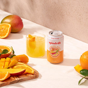 Spindrift Mango Orange packshot displaying gluten-free, non-GMO credentials