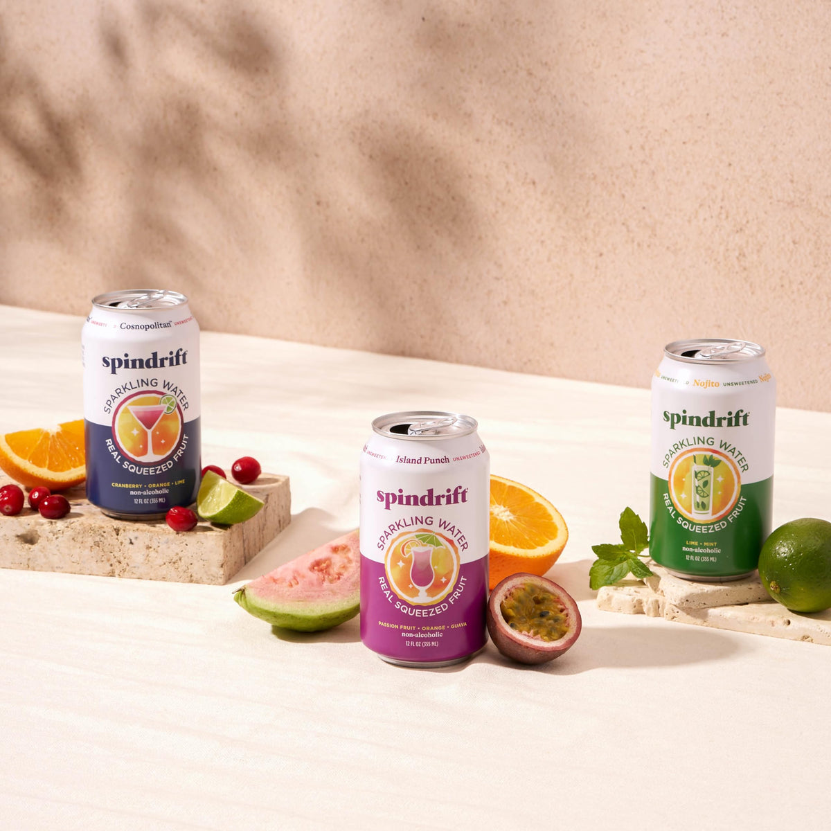 Spindrift mocktail cans 24 side angle highlighting no added sugar and calories per can