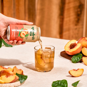 Spindrift Peach Green Tea packaging emphasizing real fruit and natural ingredients