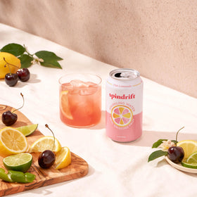 Spindrift Pink Lemonade ingredients close-up highlights real squeezed fruit.