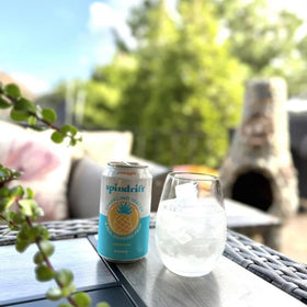 Spindrift pour action into a tall glass for quick refreshment.