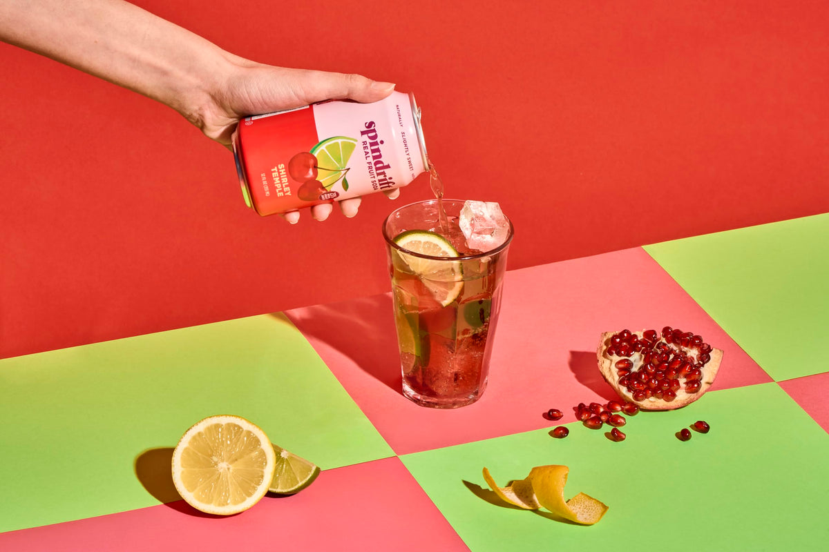 Spindrift Shirley Temple Cherry Citrus can closeup highlights clean ingredients and low calories.