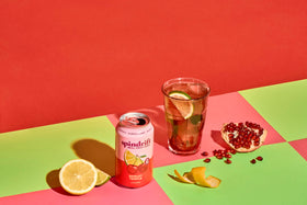 Spindrift Shirley Temple Cherry Citrus party-glass conveys a family-friendly non-alcoholic option.