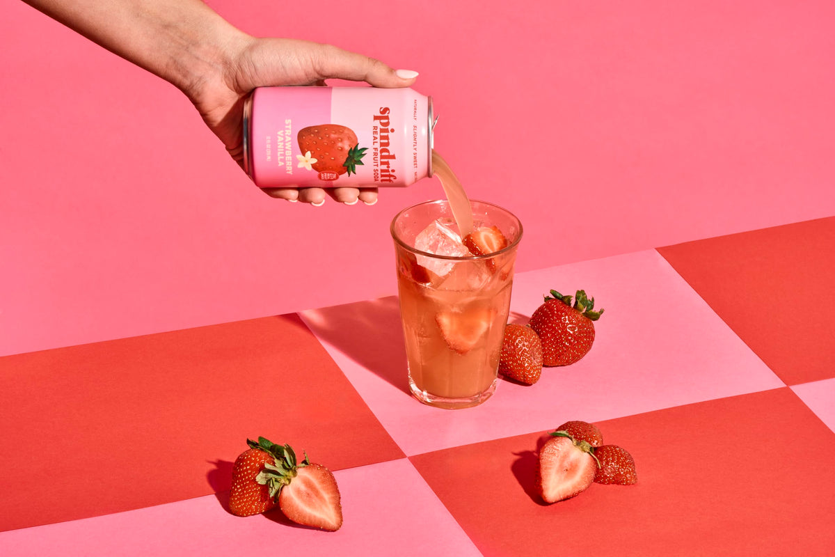 Spindrift 12-pack beside ice highlights clean ingredients and refreshing flavor