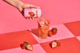 Spindrift 12-pack beside ice highlights clean ingredients and refreshing flavor