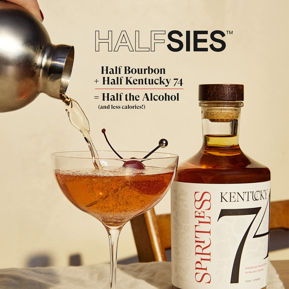 Spiritless Kentucky 74 bottle being poured into a glass for a non-alcoholic cocktail.
