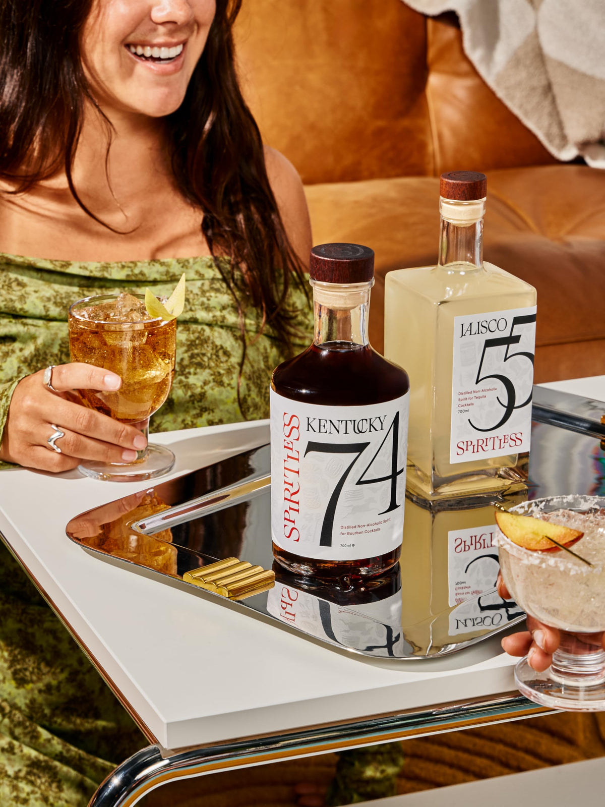 Prepared Old Fashioned using Spiritless Kentucky 74 with ice and orange garnish.
