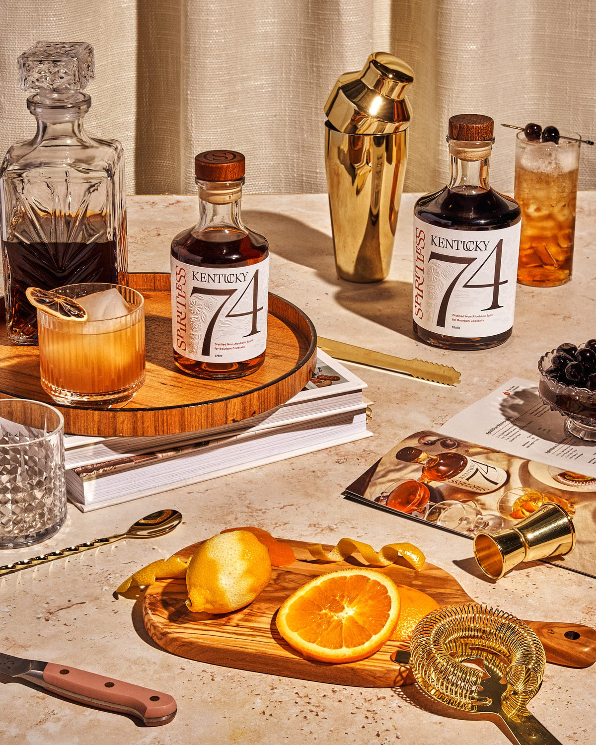 Spiritless Kentucky 74 on a wooden bar reflects warm Kentucky craft.