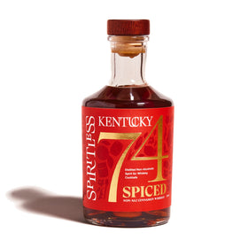 Spiritless Kentucky 74 Spiced bottle on bar showcases cinnamon-forward flavor ideal for cocktails.
