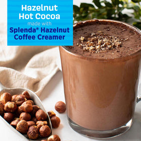 Six-pack SPLENDA Hazelnut sugar-free creamer for households and offices.