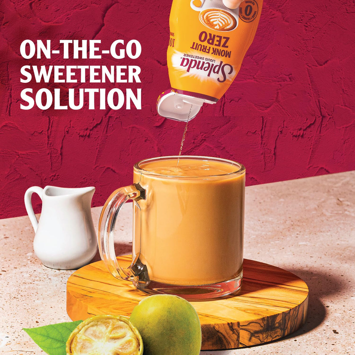 SPLENDA Monk Fruit Liquid Drops two-pack on kitchen shelf for everyday sweetness.