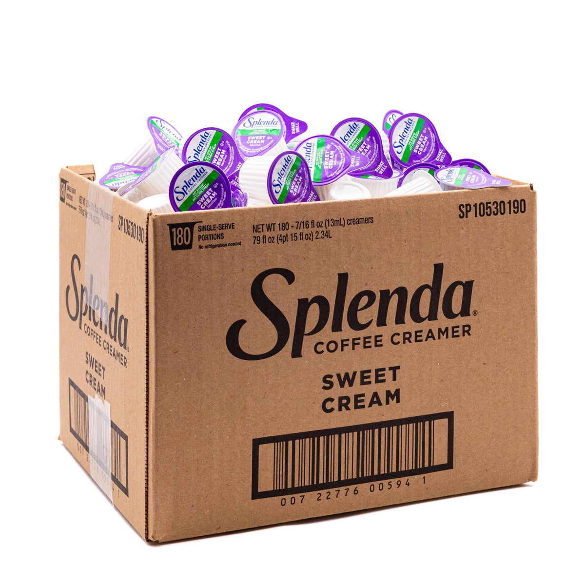 Splenda single-serve creamer cups on the counter for sugar-free daily coffee