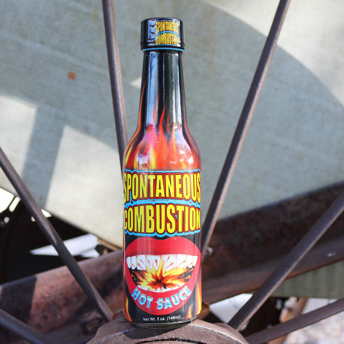 Spontaneous Combustion ingredient-list emphasizes habanero and capsicum notes.