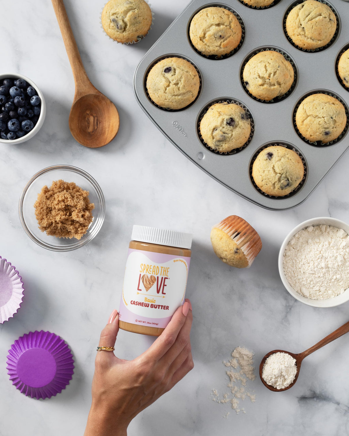 Small-batch Spread The Love cashew butter emphasizes premium freshness.