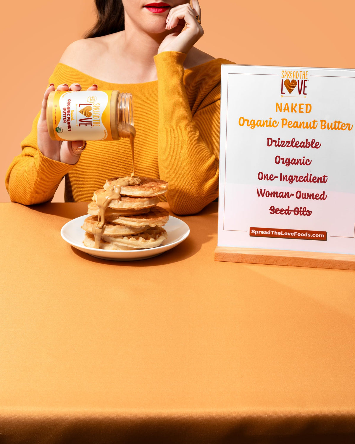 Spread The Love Naked Organic Peanut Butter family-friendly serving idea on toast.