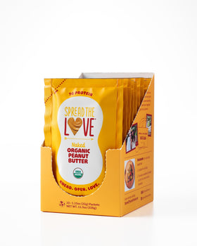Spread The Love Naked Peanut Butter jar front, creamy texture ideal for toast and smoothies.