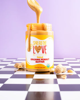 Spread The Love Naked Organic Peanut Butter small-batch USA production badge.