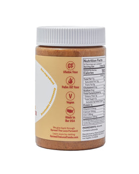 Spread The Love Unsalted Crunch Almond Butter spoon-dip highlighting a smooth bite