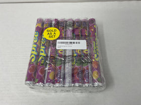 Spree candy rolls close-up shows tangy coating over chewy center.