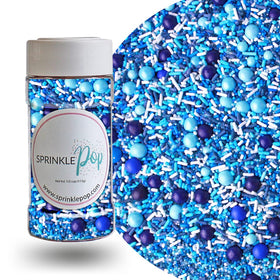 Sprinkle Pop Blue Ombre on cake creates icy ocean tones with crisp texture.