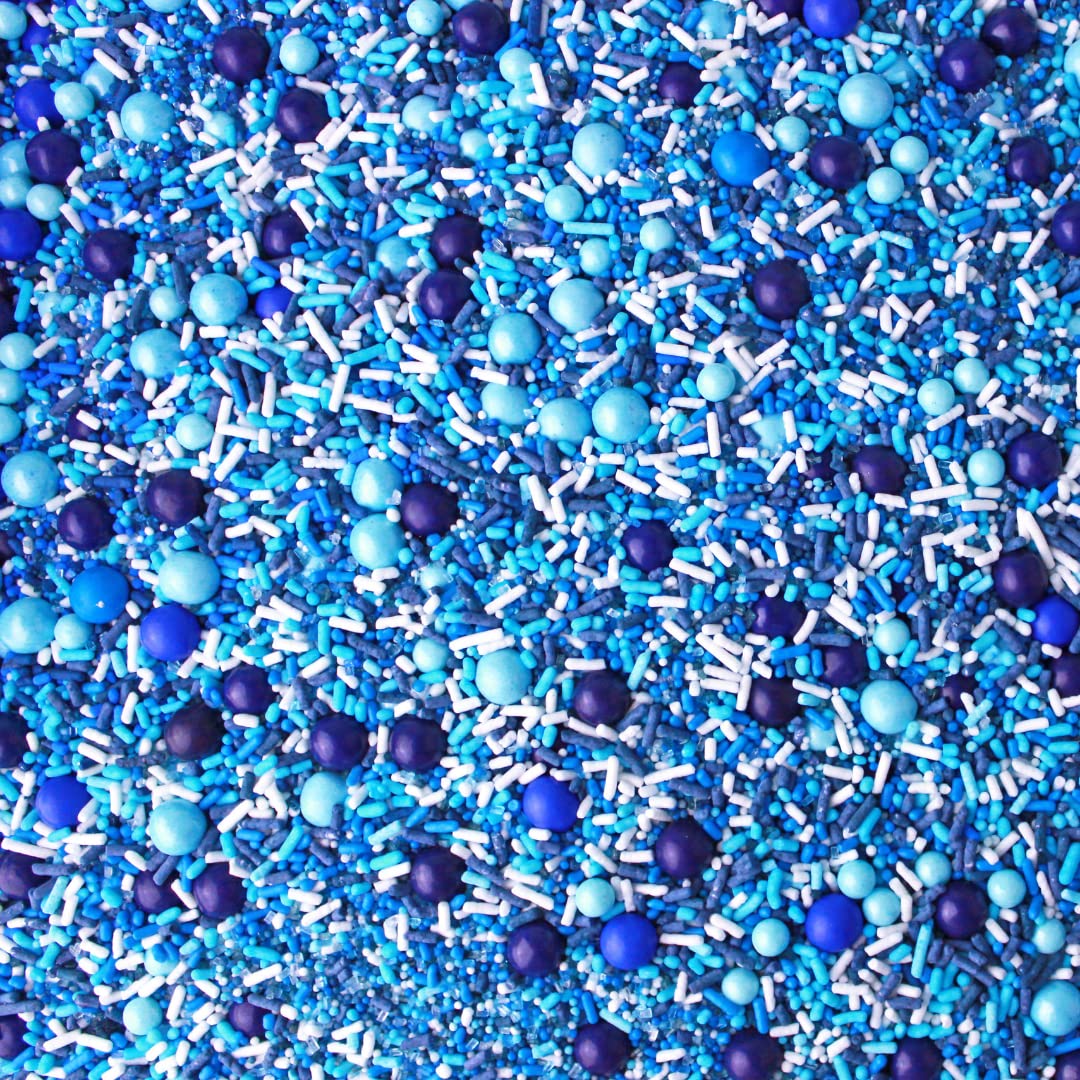 Sprinkle Pop Blue Ombre sprinkles enhance cupcakes with color and texture.