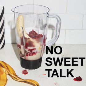 Pouring SPROUD unsweetened milk into a cup of coffee