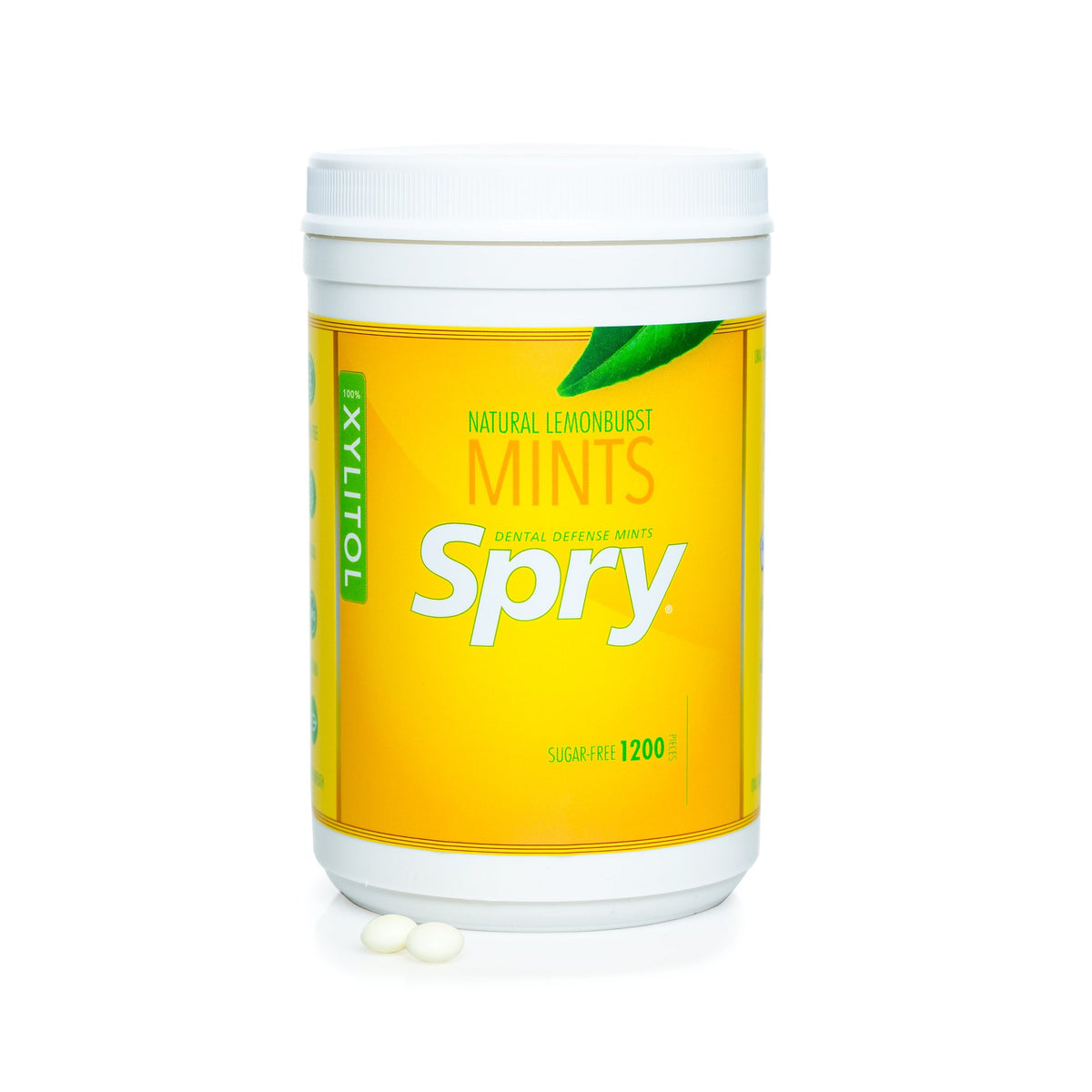 Spry Xylitol Lemon Burst Mints candy pieces on counter for daily fresh breath.