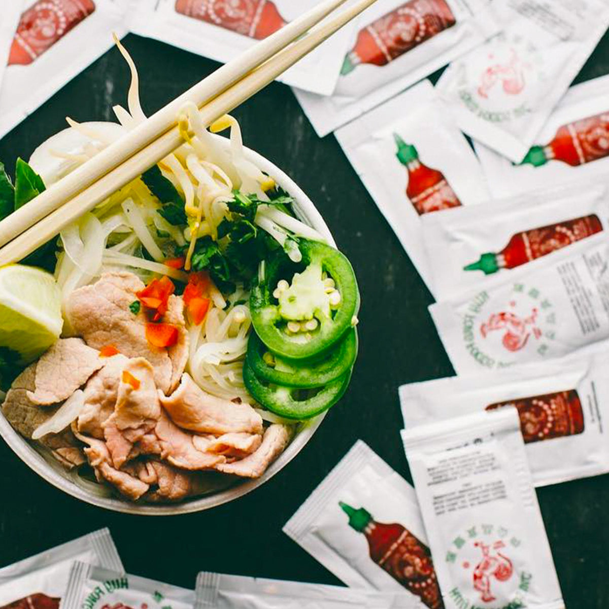 Sriracha2Go on foods like pho, pizza, and sushi.