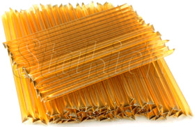 Stakich Clover Honey Sticks stirred into tea for natural sweetness.