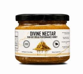 The Stampede Network Divine Nectar bottle on the counter signals natural energy.