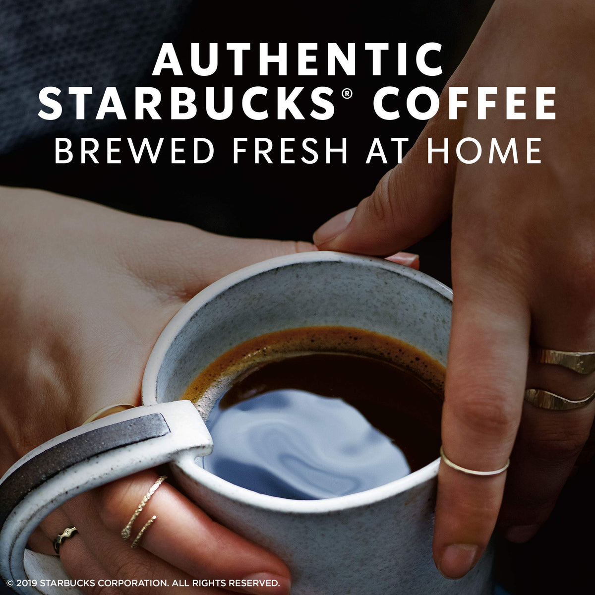 Starbucks Espresso Roast bag with scoop signals careful measuring for best taste.
