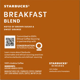 Two boxes of Starbucks Breakfast Blend K-Cup Pods on a desk setup