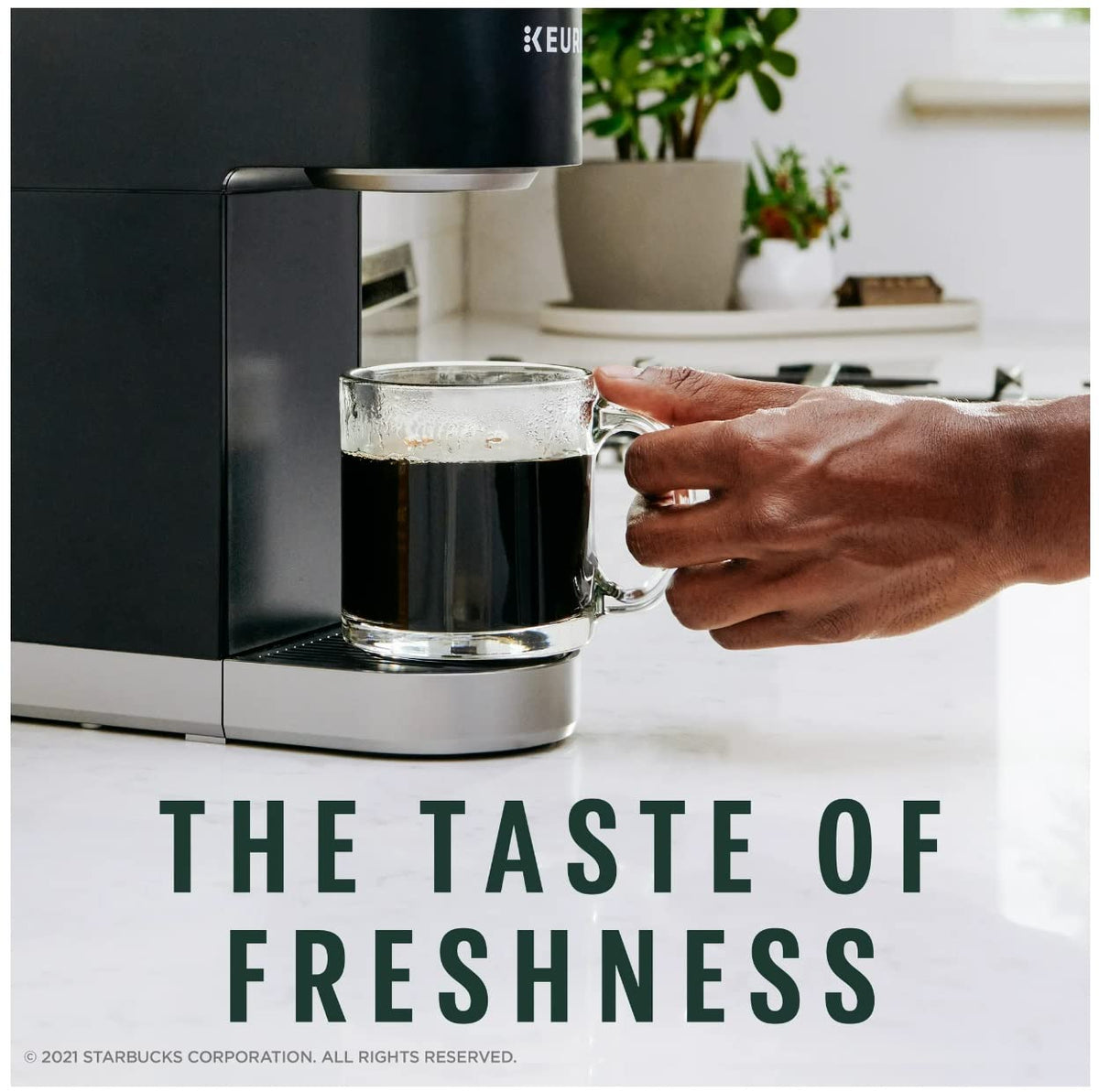 Starbucks Caramel Flavored Coffee K-Cup 44ct brew pour demonstrates easy single-serve convenience.