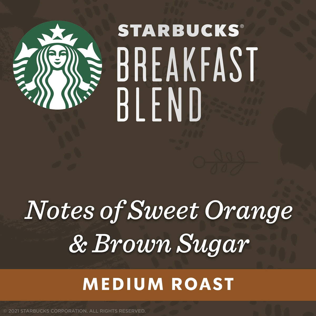 Starbucks Breakfast Blend capsules in hand, ready to brew at home.