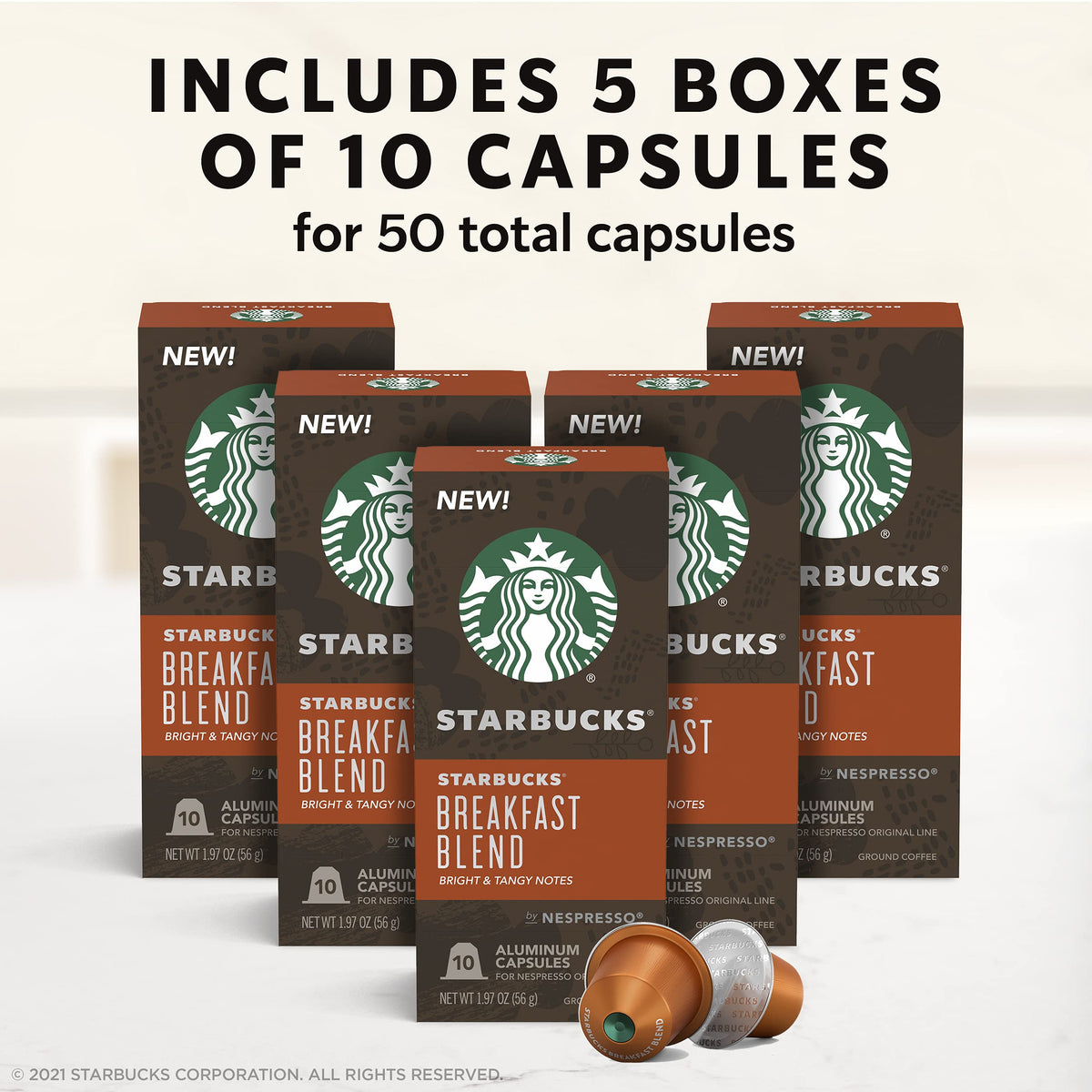 A cup beside Starbucks Breakfast Blend capsules, perfect for an easy daily ritual.