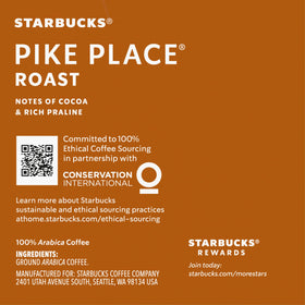 Starbucks Pike Place Roast K-Cups with cup and steam suggesting inviting aroma.