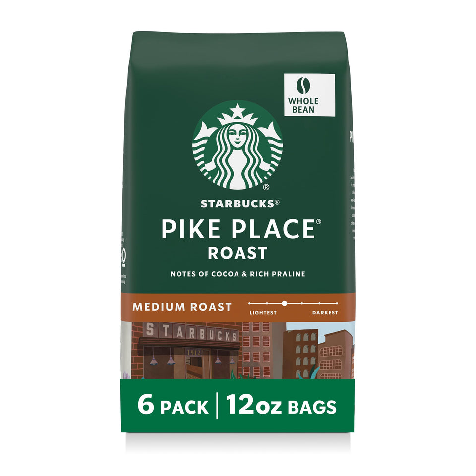 Starbucks Pike Place Roast whole beans in six-pack bags for home brewing.